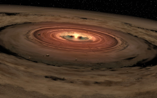 Диск у коричневого карлика OTS 44 в представлении художника. NASA/JPL-Caltech/T. Pyle (SSC). С сайта www.spitzer.caltech.edu