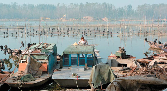 Рыбаки с бакланами на оз. Вэйшань («Природа» №5, 2017)