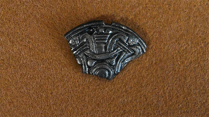 Фрагмент круглой застежки (фибулы)