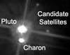 Плутон, Харон и два новых спутника (cнимки с сайта www.nasa.gov)