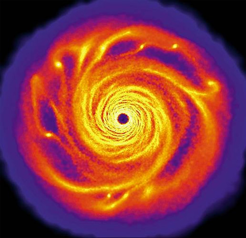 Аккреционный диск. Аккреционный диск — это структура, которая образуется из вещества, вращающегося вокруг центрального тела — молодой звезды или протозвезды, белого карлика, нейтронной звезды или черной дыры. Вещество диска под действием гравитации по спирали падает на центральную звезду, при этом происходит разогрев вещества, что порождает электромагнитное излучение, длина волны которого зависит от типа звезды. Диски вокруг молодых звезд и протозвезд излучают в длинноволновом (инфракрасном) диапазоне, а вокруг компактных массивных объектов типа нейтронных звезд и черных дыр — в коротковолновом (рентгеновском). Изображение: «Популярная механика»