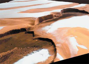 Рис. 16. Структура северной полярной шапки включает слои льда и пыли. Диаметр шапки достигает 500 км. Изображение: «Наука и жизнь»